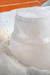 Flour with measuring Cup.