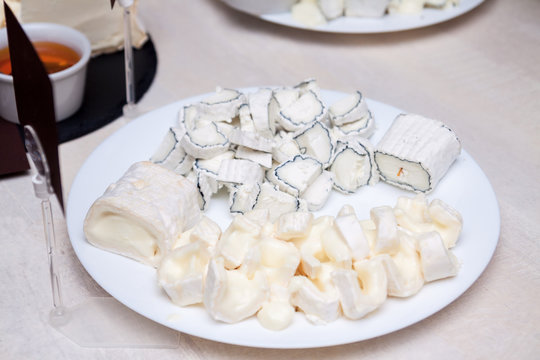 Plate of fresh sliced goat cheese