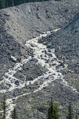 Small waterfall from a glacier in Banff National Park