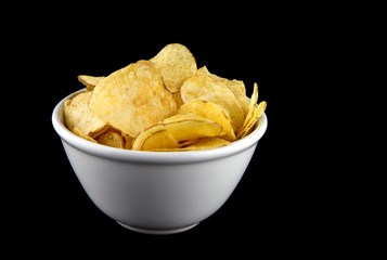 Bowl of Potato Chips on a Black Background