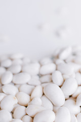 Art heart from a string bean on a wooden light background symbolizing a healthy diet