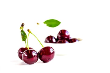 ripe cherries on a white background