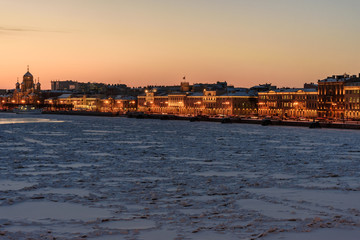 View of Lieutenant Schmidt Embankment at sunset in winter. Saint Petersburg. Russia