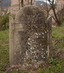 Old tombstone on a cemetery