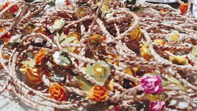 Closeup floral wreaths on the table. Summer party concept