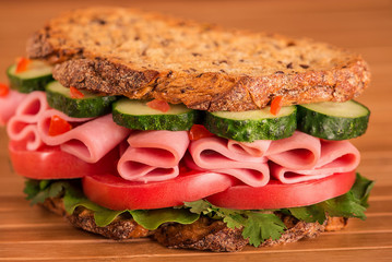 Healthy ham sandwich with cheese and tomatow