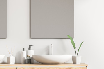Sink on wooden vanity unit, vertical mirror, white