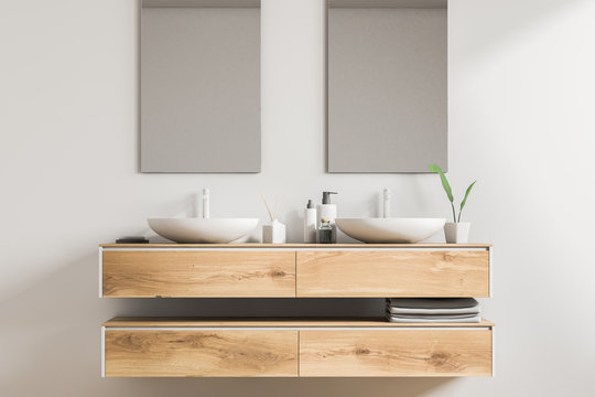 Double sink wooden vanity unit, vertical mirrors
