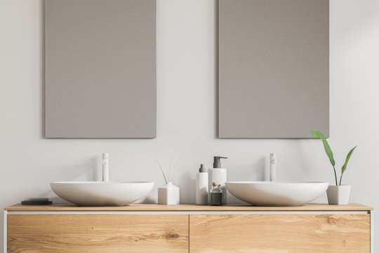 Double sink wooden vanity unit close up