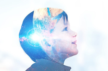 Smiling little boy, global world double exposure