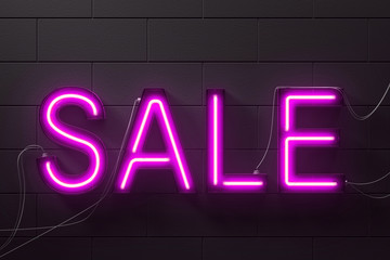 Neon purple sale sign on black brick wall