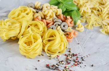 Different mix pasta types on the table, easy food concept, dinner time, homemade