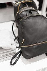 Backpacks on the counter in the store