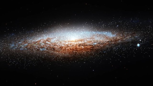 Space travel to Ufo galaxy, slow rotating in outer space with star field in background. Contains public domain image by NASA