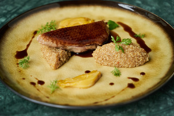 Duck breast, Quinoa and sweet chili sauce with orange fennel
