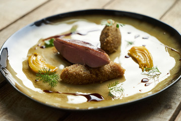 Cooked Quinoa with Duck breast meat and sweet chili sauce with orange fennel