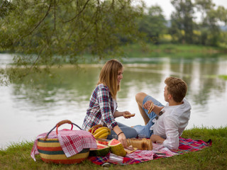 Couple in love enjoying picnic time