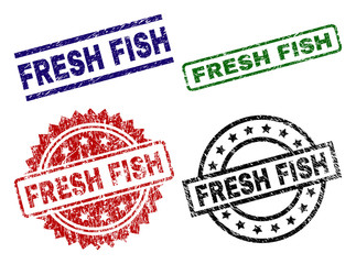 FRESH FISH seal prints with damaged texture. Black, green,red,blue vector rubber prints of FRESH FISH label with retro surface. Rubber seals with round, rectangle, medallion shapes.
