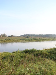 river landscape in the autumn sunny morning