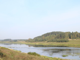 Obraz na płótnie Canvas river landscape in the autumn sunny morning
