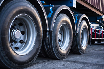 Fototapeta na wymiar large wheels of trailer on superhighway