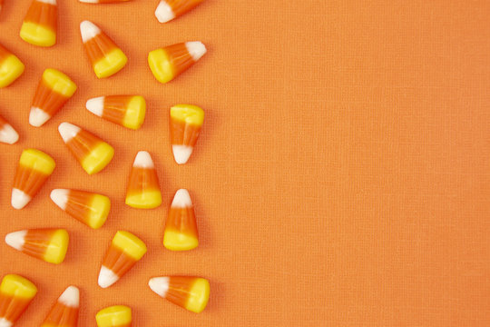 Halloween Candy Background on an Orange Surface
