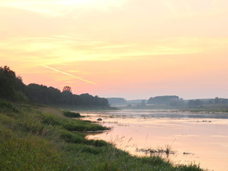 picturesque river bank at sunset