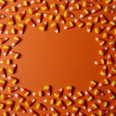 Halloween Candy Background on an Orange Surface