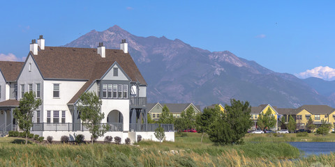 House beside a lake with view of the mountain