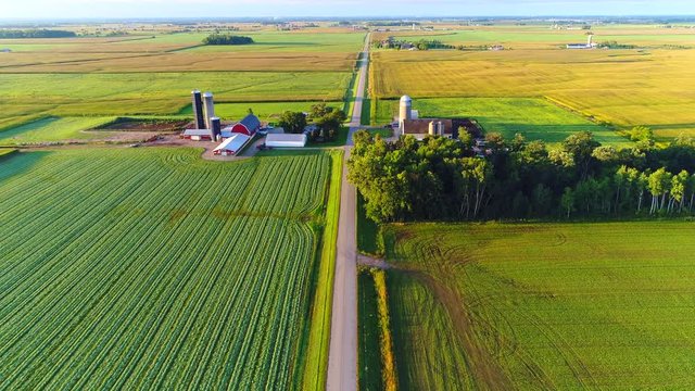 Amazing aerial view of scenic Farms at sunrise.
