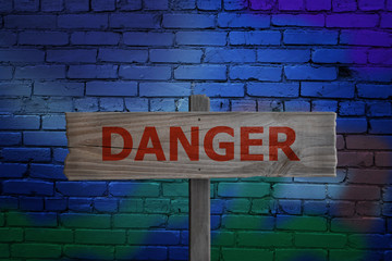 Fototapeta na wymiar Danger sign in alleyway.