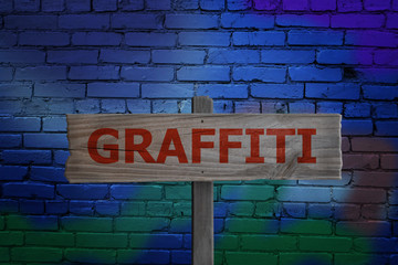 Obraz premium Graffiti sign on spray paint background
