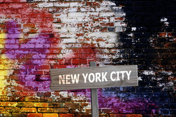 New York City sign on graffiti background