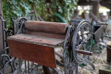 Old mangle for housework. Devices that facilitate housework in an old house.