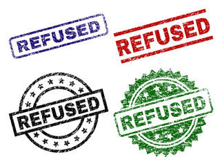 REFUSED seal stamps with distress style. Black, green,red,blue vector rubber prints of REFUSED text with unclean style. Rubber seals with round, rectangle, medallion shapes.