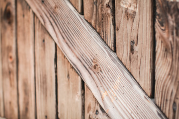 Background of old weathered wooden door with diminishing perspective and shallow dof