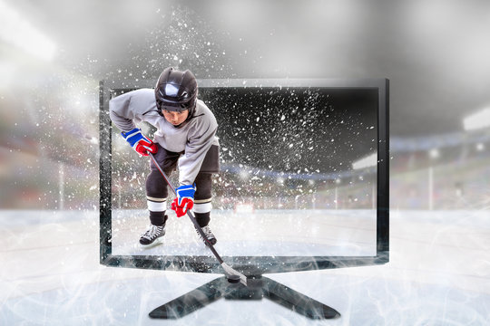 Junior Ice Hockey Player on Live 3D TV Inside Stadium