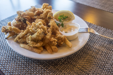 Deep Fried Clams Served with French Fries, Seafood Sauce and Wedge of Lemon