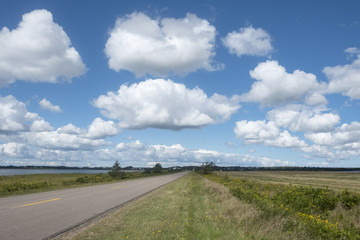 Fototapeta premium Dramatic Clouds Over Rural Landscape
