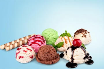 Ice cream scoops with vanilla, chocolate and