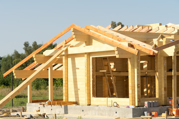 Construction of a wooden house of laminated veneer lumber.