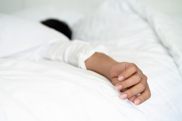 Young man sleep in bed in the bedroom.