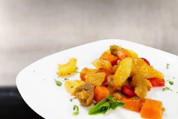 Tasty meat in white plate on light background