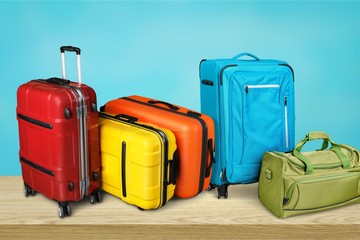 Colorful suitcases isolated on white background