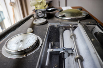 General view of vintage apothecary interior with various ingredients, antique bottles and equipment