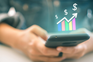 Market stock graph icon screen of smartphone background. Financial business technology freedom dream life using internet freedom life concept.