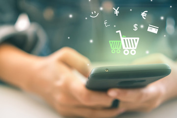 Women hand using smartphone do online selling for people shopping online with chat box, cart, dollar icons pop up. Social media maketing concept.