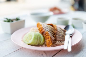Hainanese rice with crispy pork , Thai gourmet steamed crispy pork rice