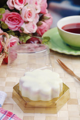 White peach ice cream moon cake on the table