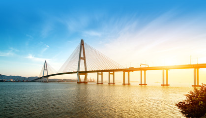 Landscape of the bridge over the sea at dusk